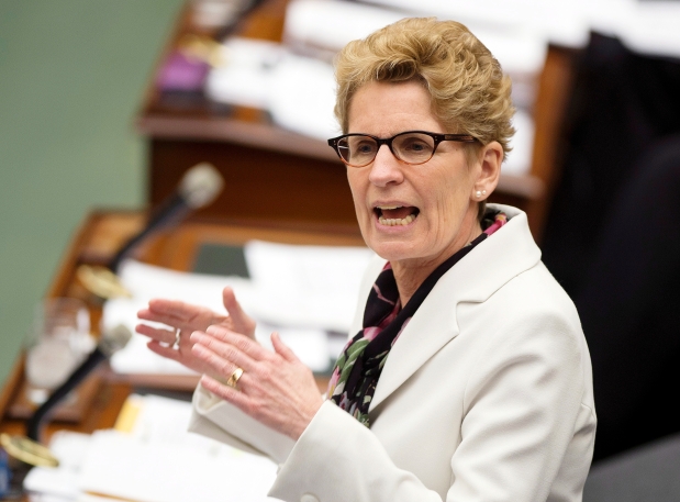 Ontario Premier Kathleen Wynne responds during question period in the Ontario Legislature n Toronto on Tuesday April 8, 2014. Photograph by: Frank Gunn , The Canadian Press.