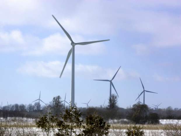 Wind powered turbines spin on a wind farm in Port Burwell, a town near London, Ontario. Derek Ruttan/The London Free Press/QMI Agency.